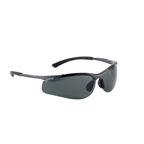Bolle Contour Safety Glasses: Polarised. Featuring a high gloss, dark metal dual material frame and rubber nose pads for comfort, these sunglasses offer platinum-coated lenses for enhanced scratch resistance and anti-fog performance.