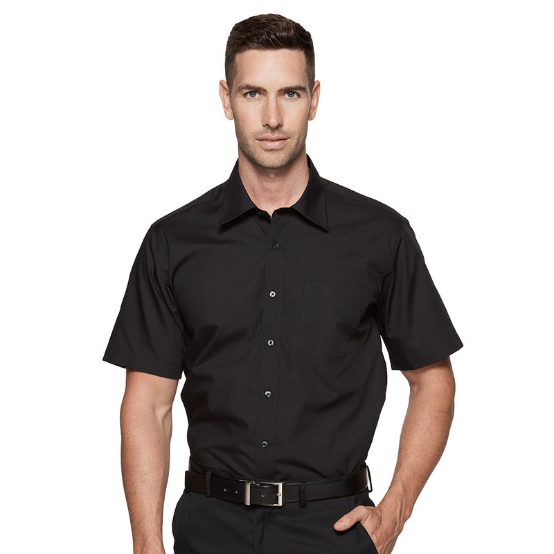 Load image into Gallery viewer, Kingswood Mens Short Sleeve Shirt worn by a man, showcasing a stylish cut with a visible collar and button details, ideal for everyday wear.