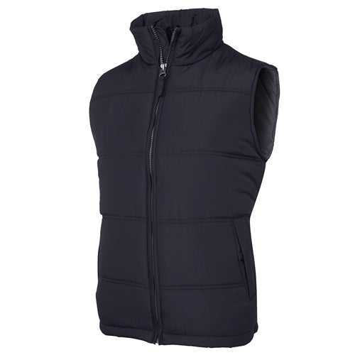JB's Adventure Puffer Vest features a chunky front zipper, horizontal design lines, and two front pockets with water-shedding flaps, ideal for workplace safety and comfort from Active Safety.
