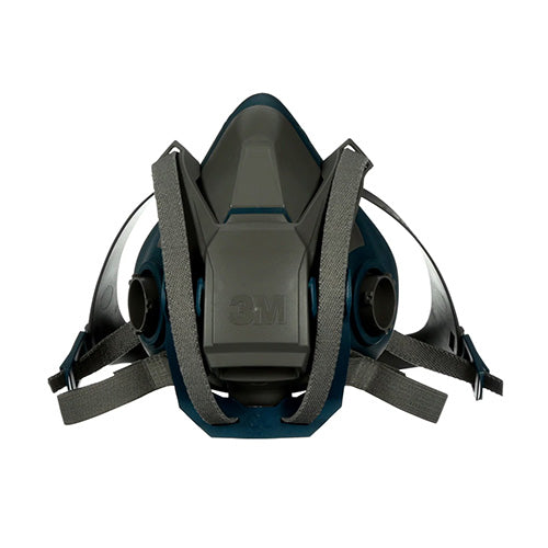 3M Rugged Comfort Quick Latch Respirator 1/2 Face Mask: Medium, shown in close-up, features a durable silicone faceseal and Quick Latch mechanism, designed for ease in tough work environments.