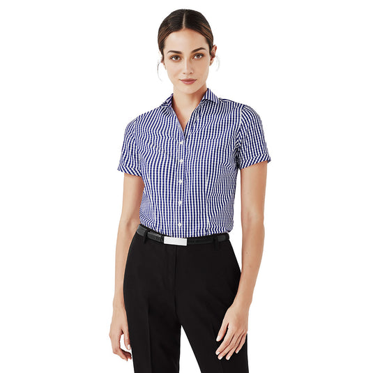 Biz Womens Springfield Short Sleeve Shirt, featuring a blue and white check design, exemplifies breathable and lightweight 100% cotton, ideal for warm climates and casual work settings.