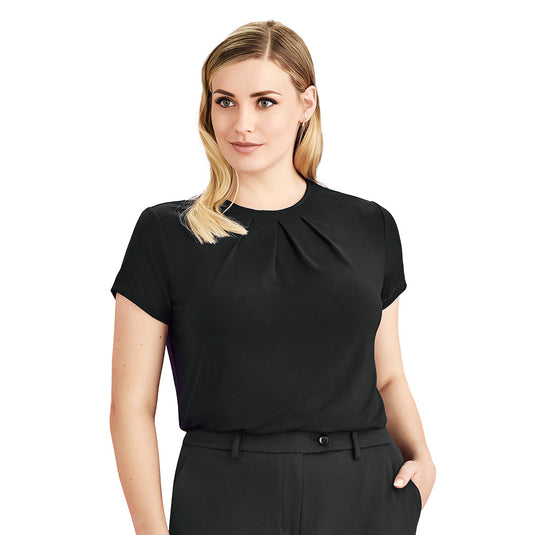 Biz Womens Blaise Short Sleeve Top on a woman, showcasing a semi-fitted design with a crew neckline and cap sleeves, crafted from luxe jersey knit for comfort and easy-care.
