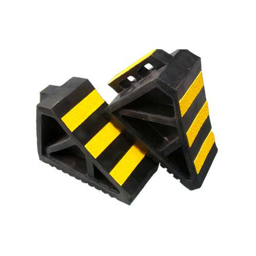 Heavy Duty Wheel Chock 3.1kg: Each, featuring a robust molded rubber construction with a serrated base for enhanced grip and a convenient handle. Ideal for trucks and cars, ensuring safety in various work environments.