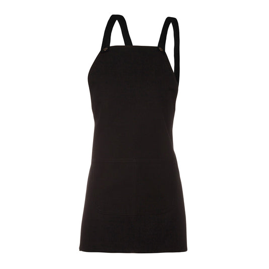 JB's Cross Back Bib Canvas Apron (Without Strap) features a durable black design with antique brass eyelets, a spacious double-stitched front pocket, and is crafted from 100% cotton duck canvas for workplace resilience.