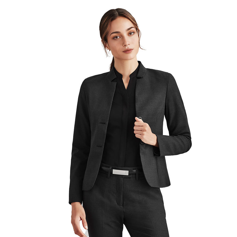 Load image into Gallery viewer, Biz Womens Comfort Wool Stretch Short Jacket showcased on a woman, highlighting its tailored fit and premium fabric. The jacket features a sleek black design with a white tag, suitable for professional settings.