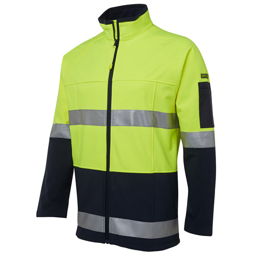 JB’s Hi Vis Day/Night Soft Shell Jacket, featuring grey stripes, a durable polyester blend, zippered pockets, and adjustable drawcord, designed for high visibility and safety in active work environments.
