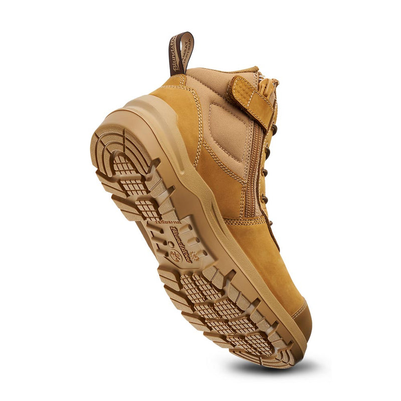 Load image into Gallery viewer, Blundstone 7550 DuraFit Safety Boots, Wheat, showcasing a rugged tan ankle boot with a composite toe, side zipper, lace-up front, and lugged outsole, designed for durability and comfort in demanding work environments.