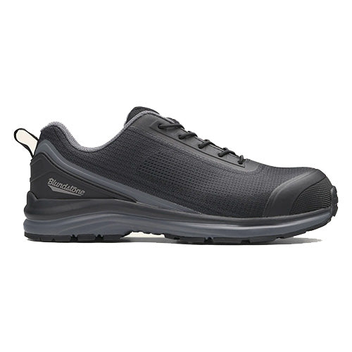 Blundstone 883 Safety Shoes: Close-up of a black shoe, showcasing elasticated laces and TPU toe guard, designed for women's comfort and safety with XRD® cushioning and slip-resistant outsole.