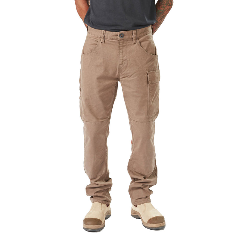 Load image into Gallery viewer, Volcom Workwear Caliper Pant on a man, showcasing durable design with dual entry cargo and utility pockets, reinforced knees, and triple needle stitching, ideal for active and safety-focused work environments.