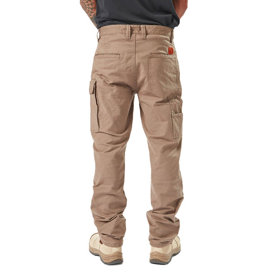 Volcom Workwear Caliper Pant showcased on a man, highlighting its modern fit with dual entry cargo and utility pockets, reinforced knees, and signature embroidery, ideal for durable workplace use.