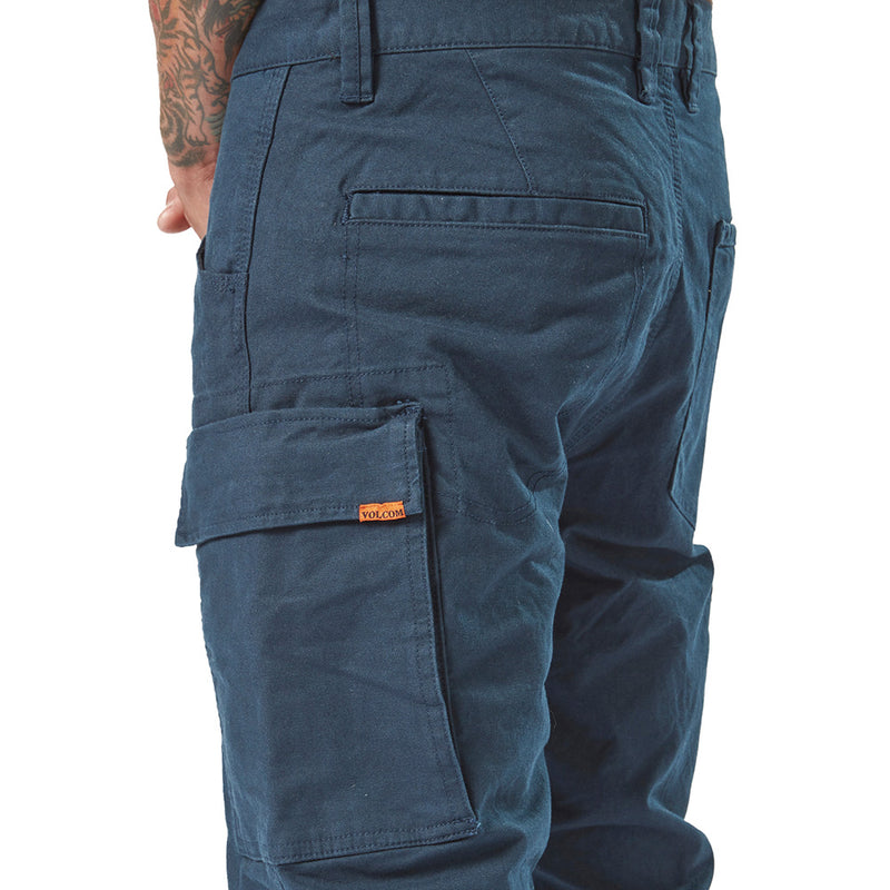 Load image into Gallery viewer, Volcom Workwear Caliper Cuffed Pant, featuring a close-up of the durable rear and utility pockets on a person, showcasing reinforced stitching and modern design tailored for active, safety-conscious professionals.