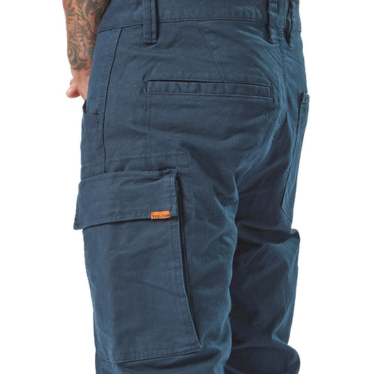 Volcom Workwear Caliper Cuffed Pant, featuring a close-up of the durable rear and utility pockets on a person, showcasing reinforced stitching and modern design tailored for active, safety-conscious professionals.