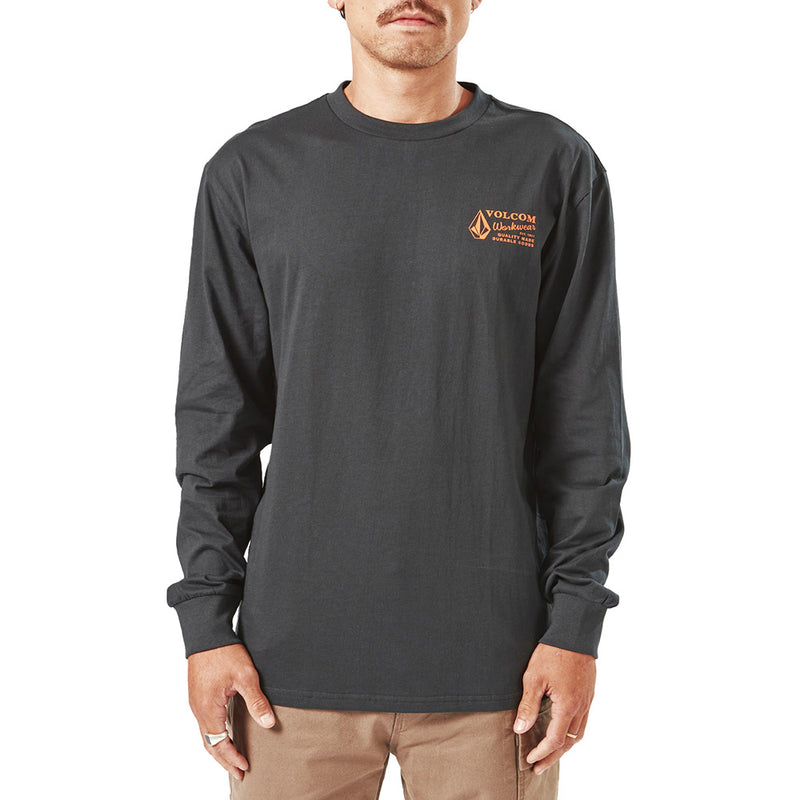 Load image into Gallery viewer, Volcom Workwear Long Sleeve Tee on a man with a mustache, showcasing the modern fit and durability. Features soft hand screenprint and exterior woven label, embodying creative liberation and functionality.