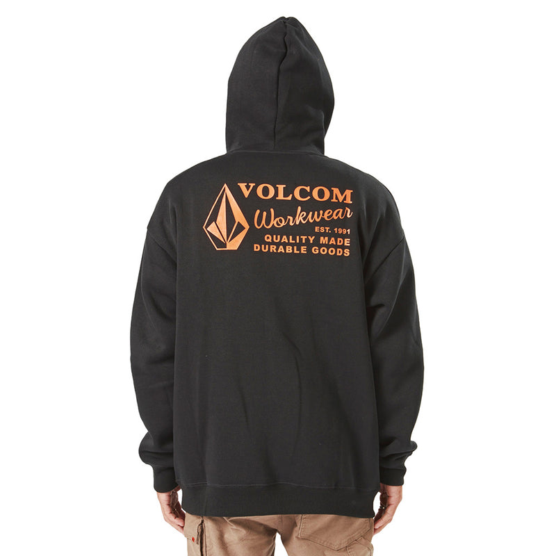 Load image into Gallery viewer, Volcom Workwear Pullover Fleece Hoodie showcasing a person wearing a black hoodie featuring an orange logo, highlighting durable design with a lined hood and front joey pocket.