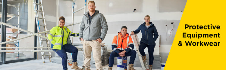 A group of workers on a building site wearing their workwear and hi vis uniforms. This showcases Active Safety's commitment to offering a diverse range of uniform for hi vis and workwear applications for both men and women. They are all wearing Safety Boots which is a core part of the Safety Equipment & Workwear offering at Active Safety.