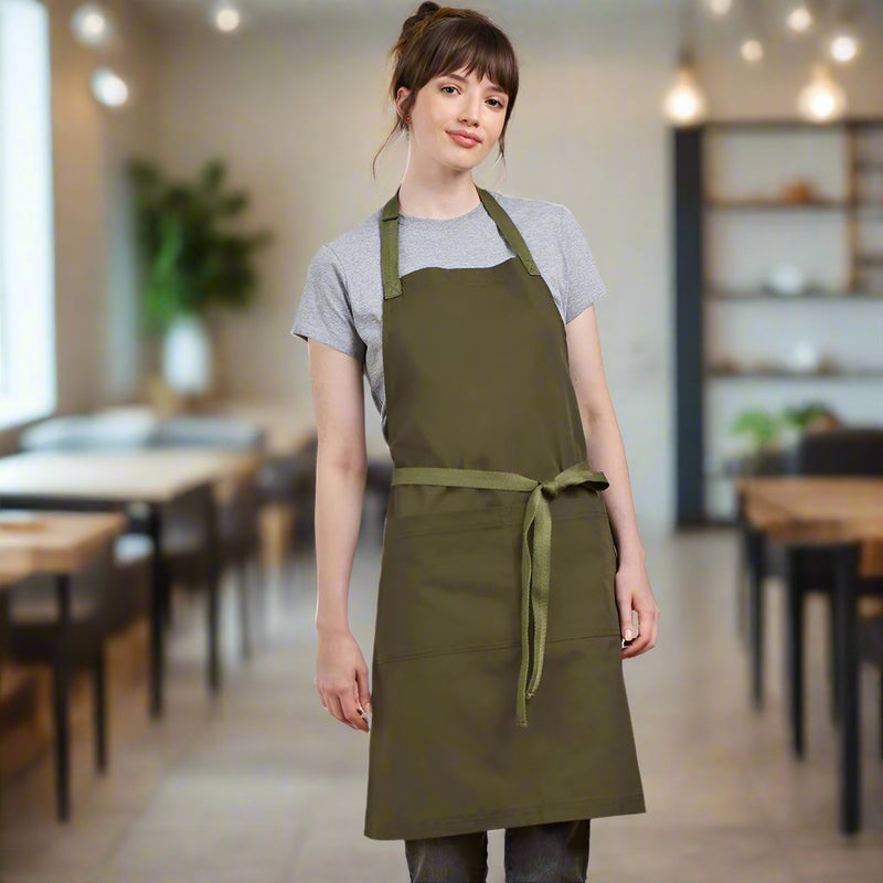 Load image into Gallery viewer, Biz Barley Apron in a classic bib style, featuring a durable, no-fade canvas with adjustable neck strap and large split front pocket, ideal for uniforms in professional settings.