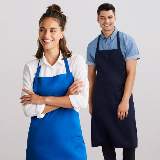Biz Bib Apron featuring an adjustable neck strap, towel loop, and large front pocket with pen and bottle opener slots, ideal for culinary tasks. Made of durable polyester-cotton blend, emphasizing functionality and style.