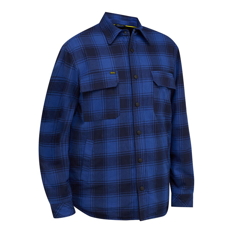 Load image into Gallery viewer, Bisley Check Flannel Shacket with Sherpa Lining features a blue and dark-navy plaid pattern, snap-front closure, flap chest pockets, and side hand-warmer pockets, ideal for warmth and style in active safety environments.