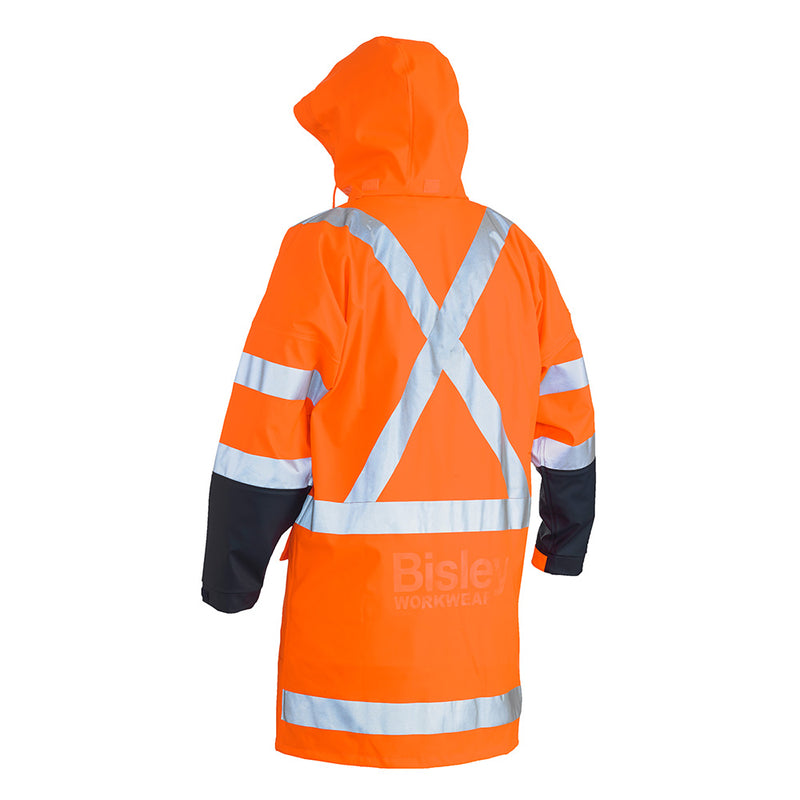 Load image into Gallery viewer, Bisley X Tape Stretch TTMC-W17 Rain Jacket being worn, showcasing its reflective X back, biomotion taping, and adjustable cuffs, ideal for high-visibility workwear.