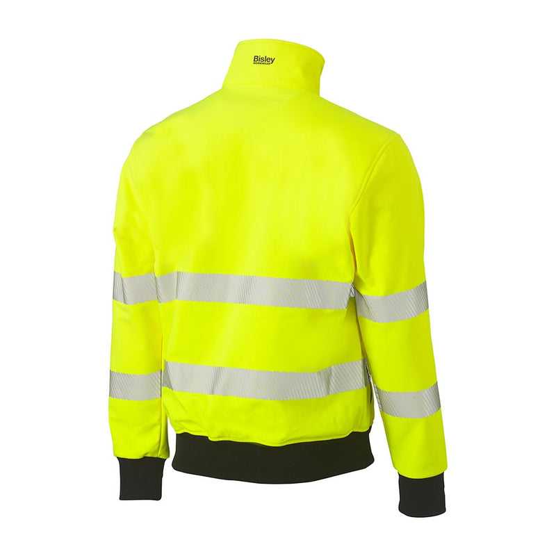 Load image into Gallery viewer, Bisley Hi Vis Soft Shell Bomber Jacket, back view, showcasing fluorescent yellow fabric with reflective silver bands, black ribbed cuffs and hem, and Bisley Workwear logo on the collar, emphasizing safety and durability.