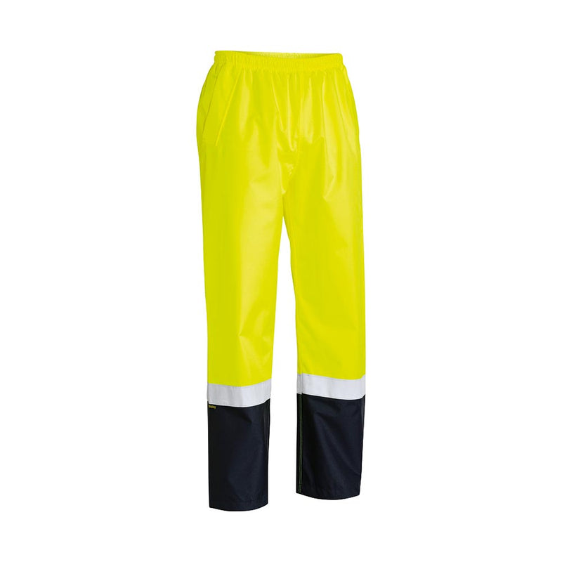 Load image into Gallery viewer, Bisley Hi Vis Taped Rain Trouser, featuring reflective tape on the lower leg, elastic waistband, and adjustable hems, designed for safety and comfort with waterproof, breathable fabric, ideal for workplace safety needs.