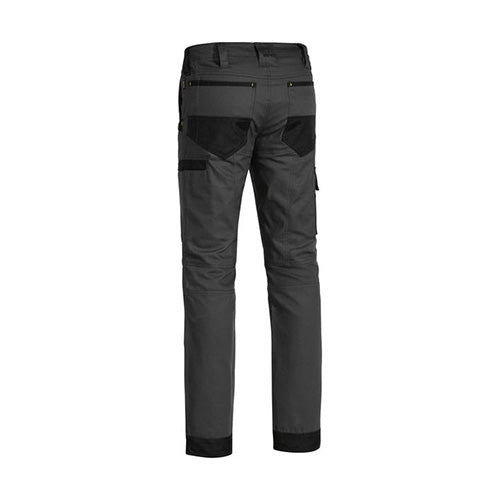 Bisley Flex & Move Stretch Pant featuring a modern fit, multi-functional pockets, reinforced belt loops, and a curved waistband, designed for durability with double-layer knees and hem boot cuffs, ideal for active workplace safety.