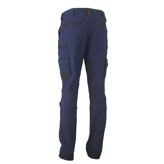 Bisley Flex & Move Stretch Utility Cargo Pants showcasing a close-up of a reinforced denim pocket with Cordura® highlights, emphasizing durability and multifunctional design, ideal for active workplaces.
