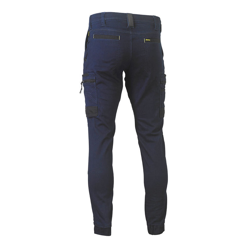 Load image into Gallery viewer, Bisley Flex & Move Stretch Cargo Cuffed Pants, featuring back view with multiple thigh pockets, elasticated hems, and reinforced double-layer knees for durability, exemplifying sturdy workwear aligned with Active Safety's commitment to quality.