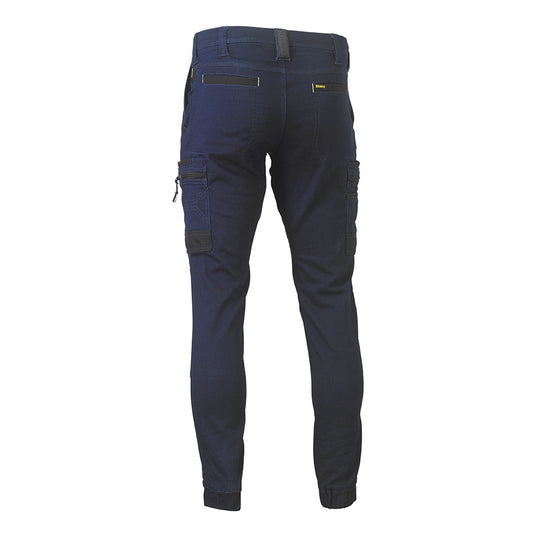 Bisley Flex & Move Stretch Cargo Cuffed Pants, featuring back view with multiple thigh pockets, elasticated hems, and reinforced double-layer knees for durability, exemplifying sturdy workwear aligned with Active Safety's commitment to quality.