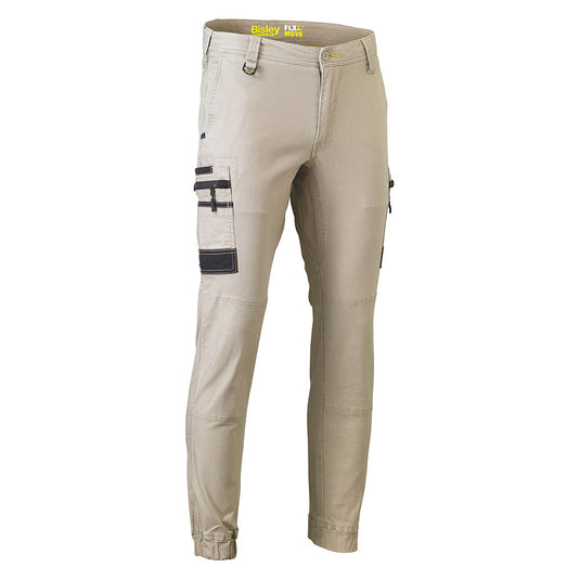 Bisley Flex & Move Stretch Cargo Cuffed Pants feature slim, tapered legs with elastic cuffs, multiple pockets, and reinforced knees, ideal for workplace safety and comfort, reflecting Active Safety’s commitment to durable workwear.