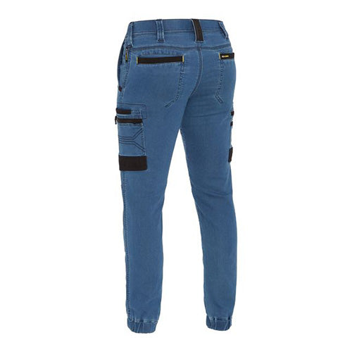 Bisley Stretch Denim Cargo Cuffed Pants featuring black pockets and double-layered knees for durability, designed with multifunctional cargo pockets and reinforced belt loops, ideal for workplace safety and comfort.