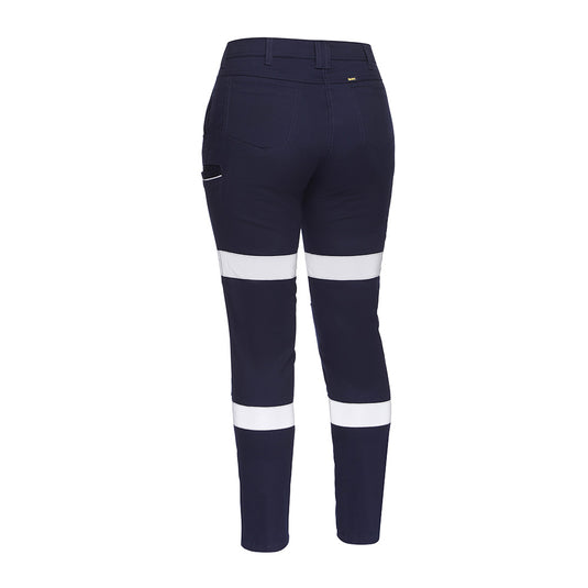 Bisley Women's Taped Stretch Cotton Pants showcasing a back view, highlighting reflective biomotion tape and multiple pockets, ideal for safety and workwear environments.