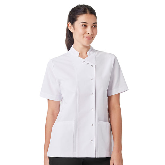 Biz Womens Essence Jacket with modern styling features a mandarin collar, asymmetrical front, and ring-snap fasteners. Ideal for professionals, its streamlined short-sleeve design offers functionality and comfort in medical environments.