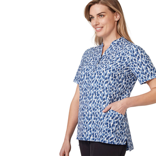 Biz Womens Florence Stardust Print Tunic, featuring a Y-neck mandarin collar, triangle cut-out sleeves, longer hem, side splits, and durable front pockets, designed for style, comfort, and functionality in workwear.