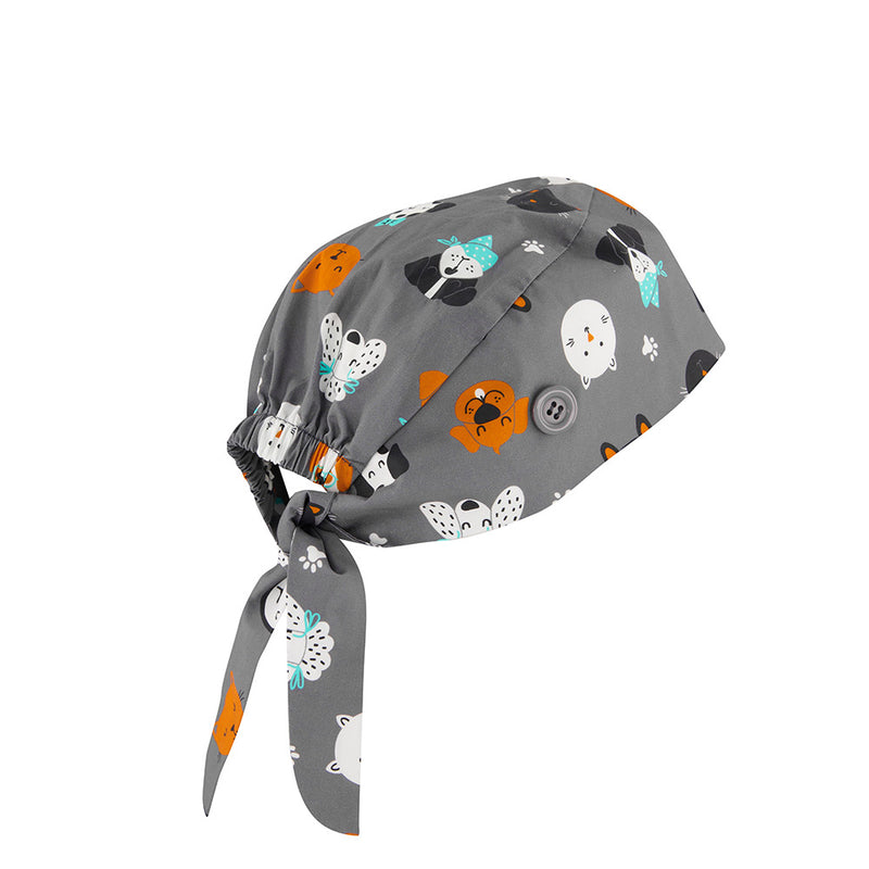 Load image into Gallery viewer, Biz Unisex Printed Scrub Cap made from breathable 100% cotton, featuring an elastic back for easy fit over buns and side buttons for mask attachment, enhancing comfort in active safety environments.