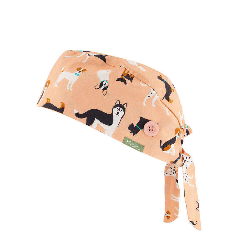 Load image into Gallery viewer, Biz Unisex Printed Scrub Cap made from soft 100% cotton, features an elasticated back for easy fit over buns, and side buttons for masks, enhancing comfort and functionality in healthcare settings.