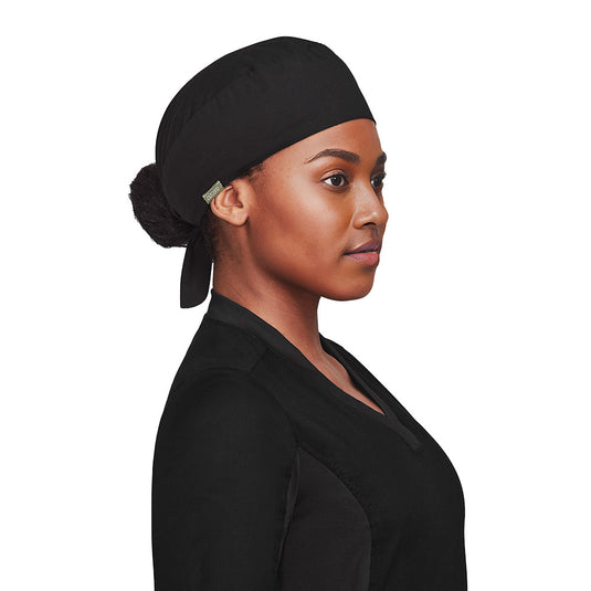 Biz Unisex Reversible Scrub Cap, designed for industrial laundering, features an elastic back and tie, fitting comfortably over buns. Made from a cotton blend with antibacterial properties, ideal for workplace safety.