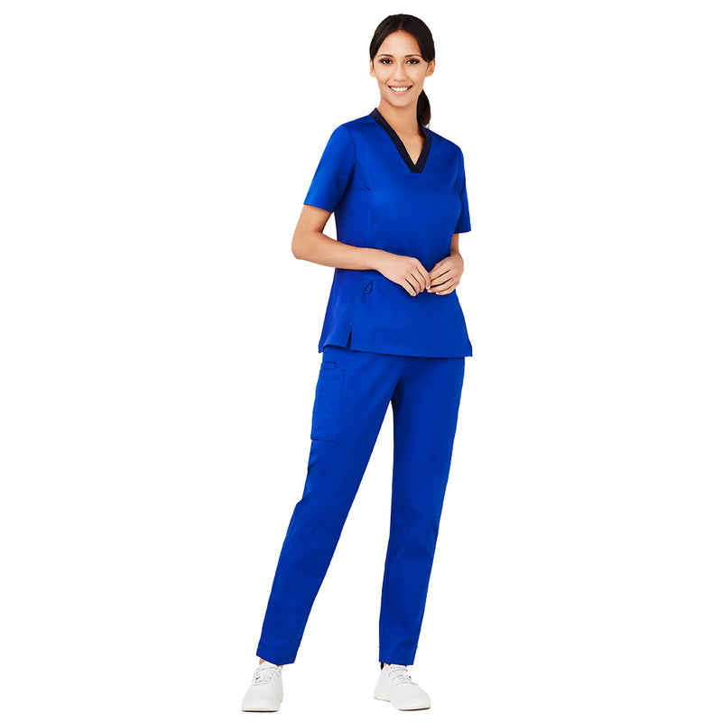 Load image into Gallery viewer, Biz Womens Riley Straight Leg Scrub Pant features a professional and comfortable design, showcased by a woman in blue scrubs, highlighting utility loops and cargo pockets ideal for healthcare professionals.