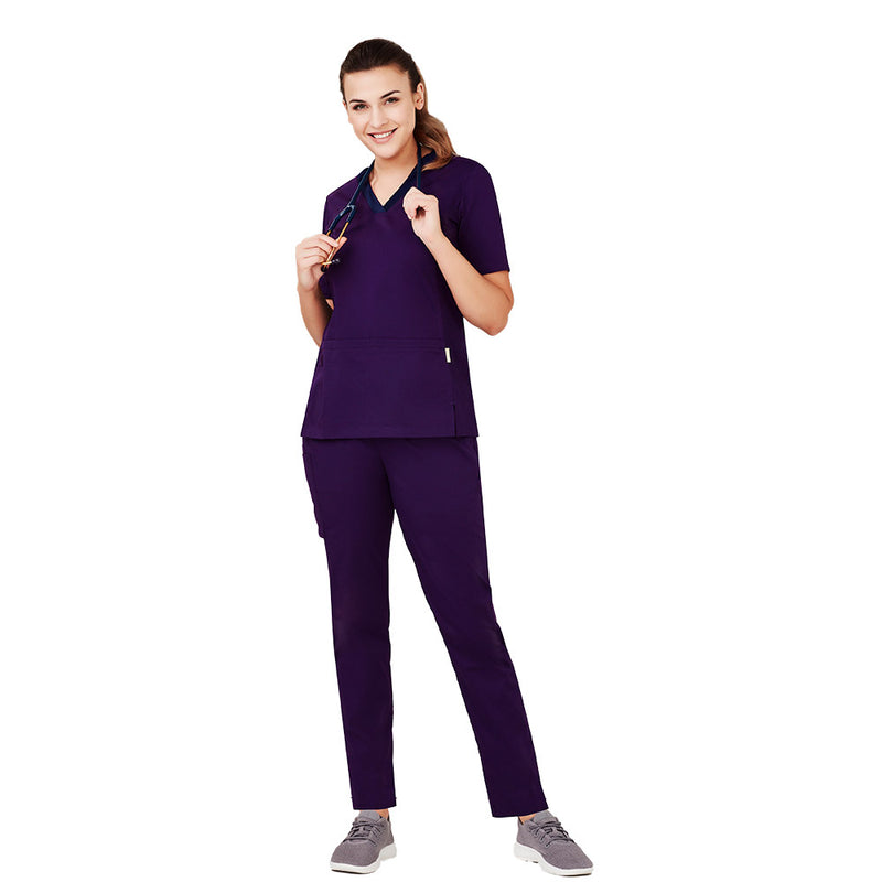 Load image into Gallery viewer, Biz Womens Riley Straight Leg Scrub Pant showcased on a woman, highlighting its comfort-focused design with cargo and side pockets, yoga-style waistband, and straight leg fit, ideal for healthcare professionals.