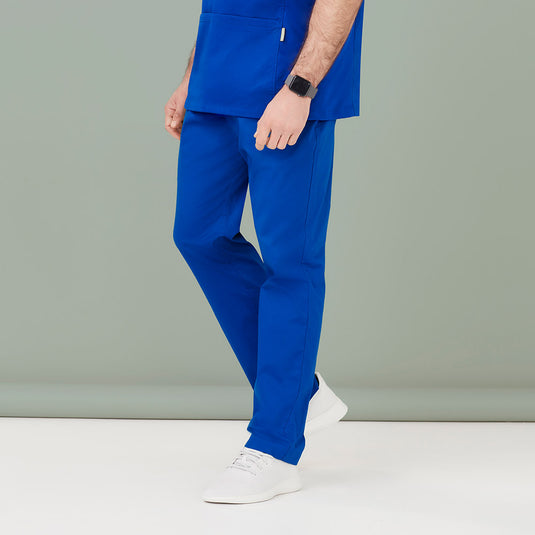 Biz Mens Riley Straight Leg Scrub Pant featuring a yoga-style flat elastic waistband and drawstring closure, cargo pockets with back gusset, and utility loops, designed for comfort and durability in active work environments.