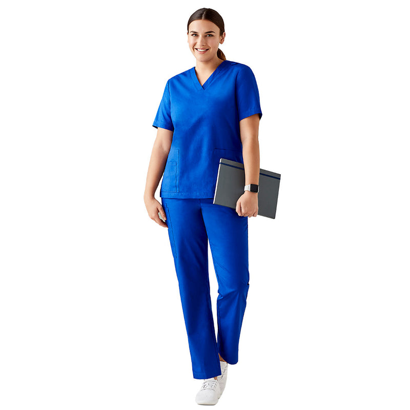 Load image into Gallery viewer, Biz Womens Tokyo Scrub Pant: Woman in blue scrubs holding a laptop, showcasing the scrub's tailored fit, elastic waistband, and cargo pocket, ideal for professional work environments.