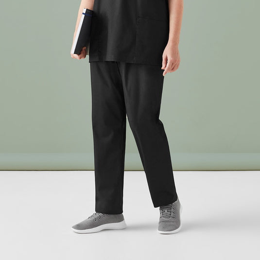 Biz Unisex Hartwell Reversible Scrub Pant displaying dual pockets on chest and back, designed for commercial laundromats with RFID chip compatibility, ideal for industrial washing processes.