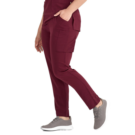 Biz Womens Avery Slim Leg Scrub Pant featuring a slim, tapered leg with an elastic waist and drawstring. Includes two side front pockets and three cargo-style pockets, designed for functionality and durability.