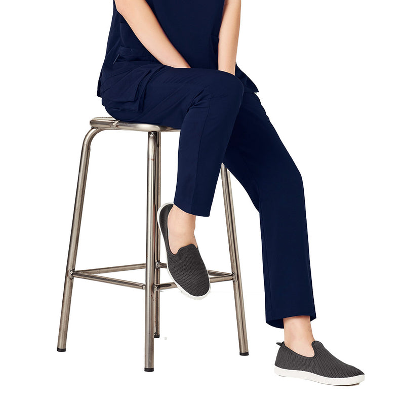 Load image into Gallery viewer, The Biz Womens Avery Slim Leg Scrub Pant features a sleek, tapered design with multiple functional pockets and utility loops, ideal for active professionals seeking comfort and durability in demanding work environments.