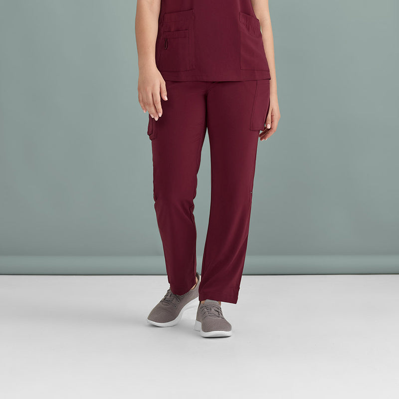 Load image into Gallery viewer, Biz Womens Avery Straight Leg Scrub Pant showcasing its durable and soft fabric, designed for comfort and functionality with side front pockets, cargo pockets, and an elastic waist, ideal for professional settings.