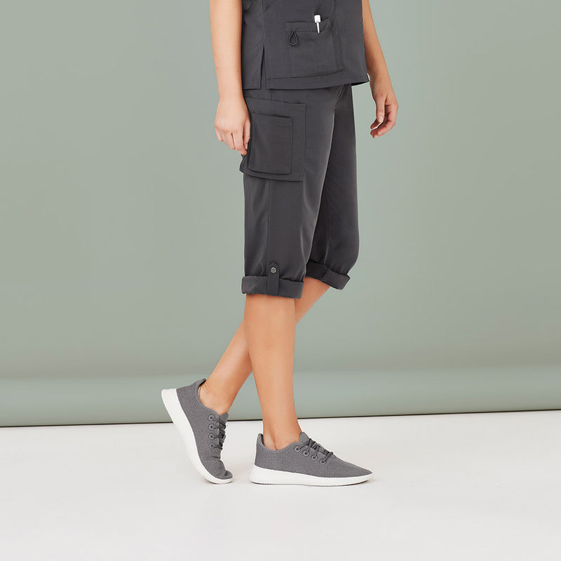 Load image into Gallery viewer, Biz Womens Avery Straight Leg Scrub Pant, designed for comfort and durability, features multiple pockets, utility loops, and roll-up capability with antique nickel studs, ideal for professional and active settings.