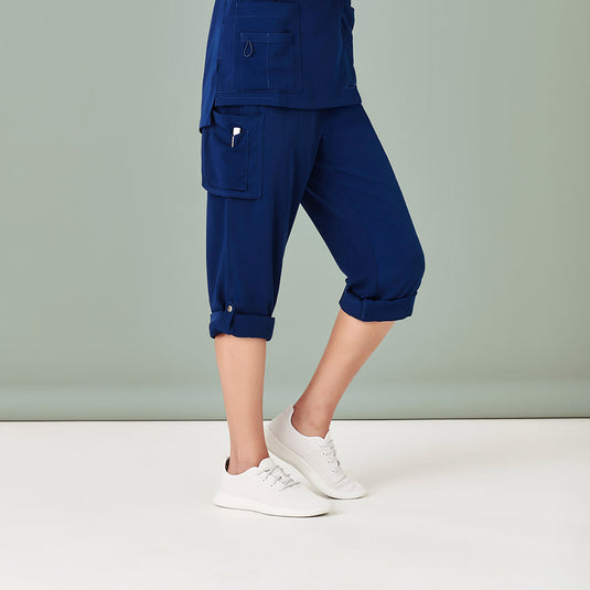 Biz Womens Avery Straight Leg Scrub Pant, designed for active professionals, features a clean, corporate look with functional cargo pockets, utility loops, and durable fabric, perfect for workplace safety environments.