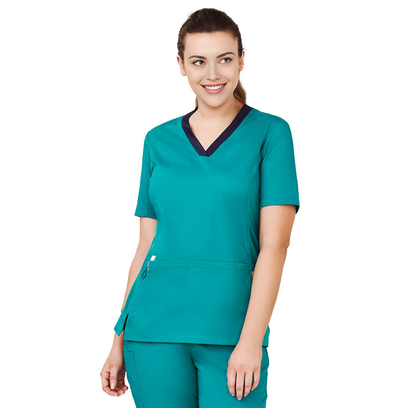 Load image into Gallery viewer, Biz Womens Riley Stretch Scrub Top with tailored fit features stretch side panels, two front deep pockets, and utility loops, designed for healthcare professionals prioritizing comfort and movement during long shifts.