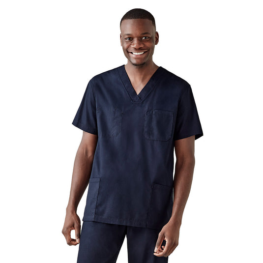 Biz Hartwell Unisex Reversible Scrub Top showcased on a smiling man, highlighting its functional design with side splits, dual front patch pockets, and a chest pocket, ideal for industrial laundering.