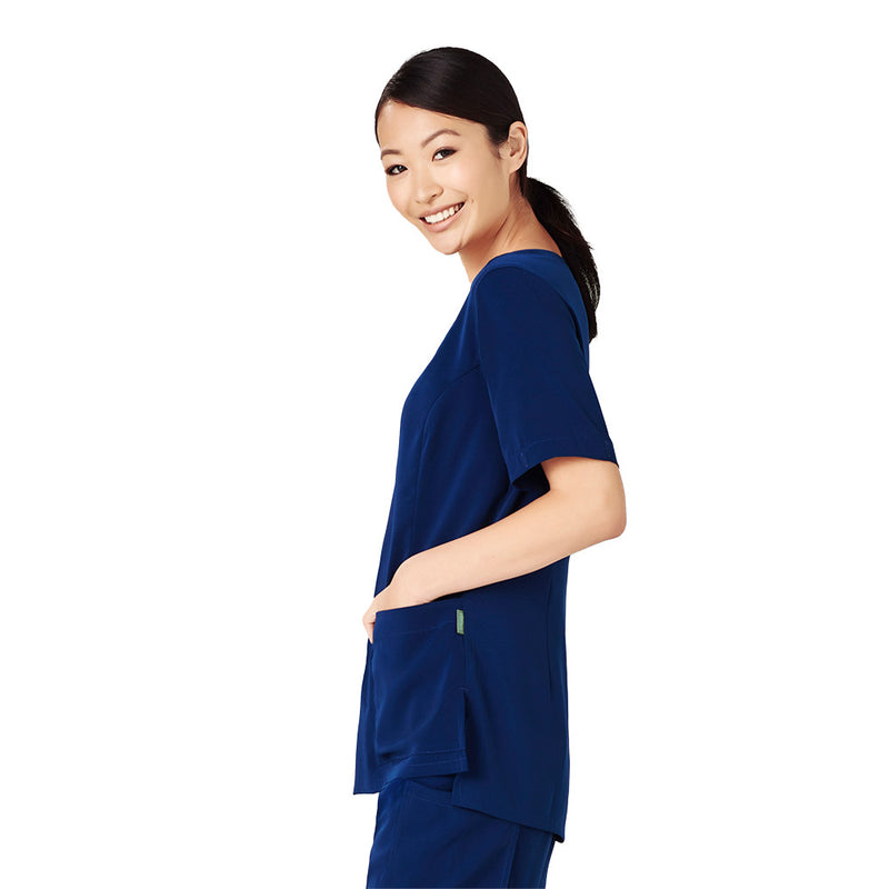 Load image into Gallery viewer, Biz Womens Avery Round Neck Scrub Top, designed for comfort and durability, features five pockets, utility loops, and tailored fit with princess seams, ideal for demanding work environments.